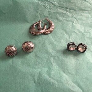 3 pairs of silver tone earrings and a delicate silver chain